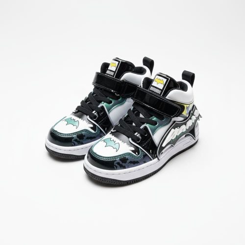Black and white Batman-themed high-top sneakers for kids with glowing bat logo, velcro straps, and comic-book inspired details.