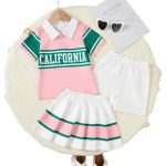 Pink and green “California” polo shirt with matching white pleated skirt and shorts — fun, summery outfit for girls.
