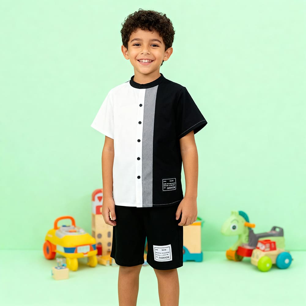Black and white colorblock button-up shirt with gray stripe + matching black shorts — modern, minimalist outfit for boys.