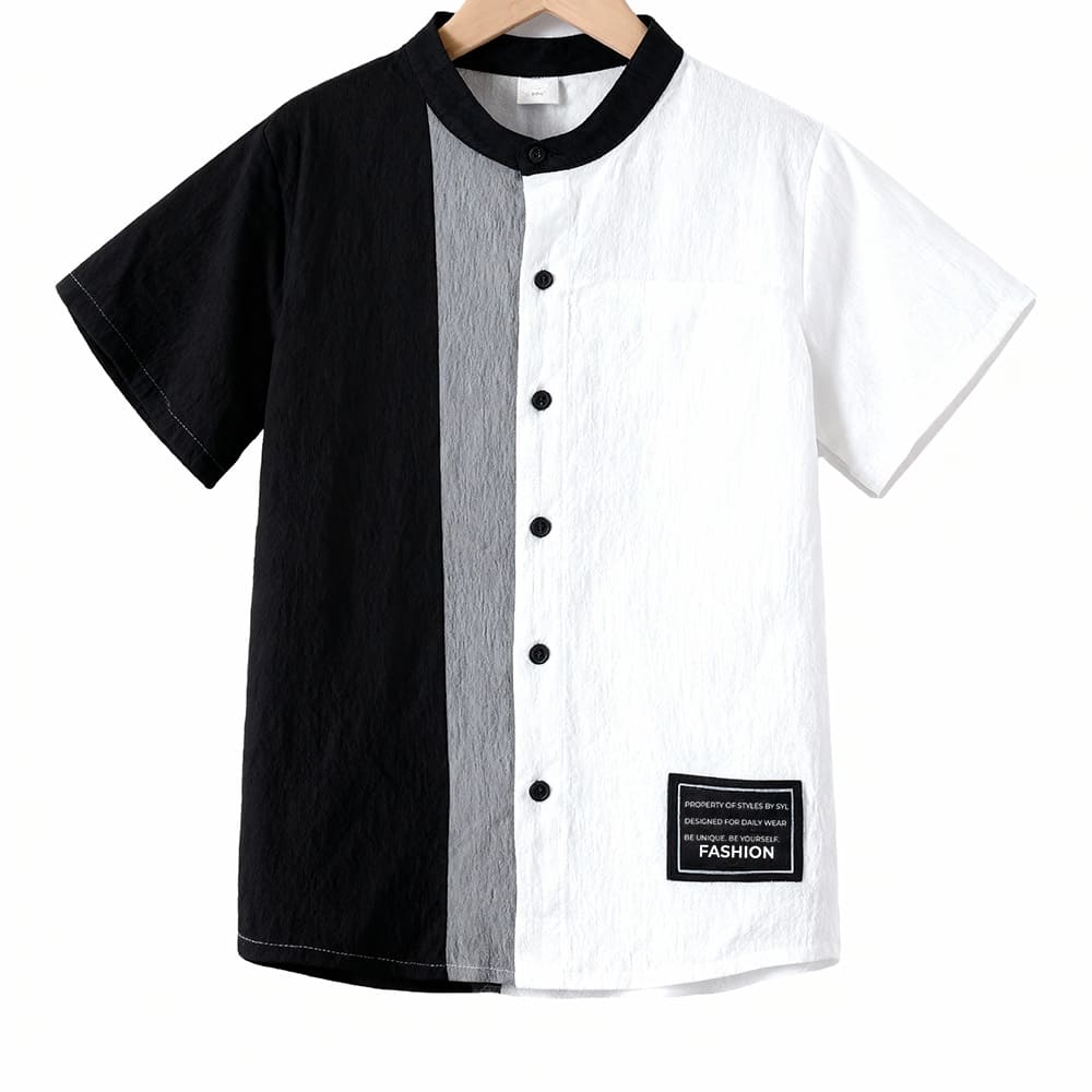 Black and white colorblock button-up shirt with gray stripe — modern, minimalist outfit for boys.