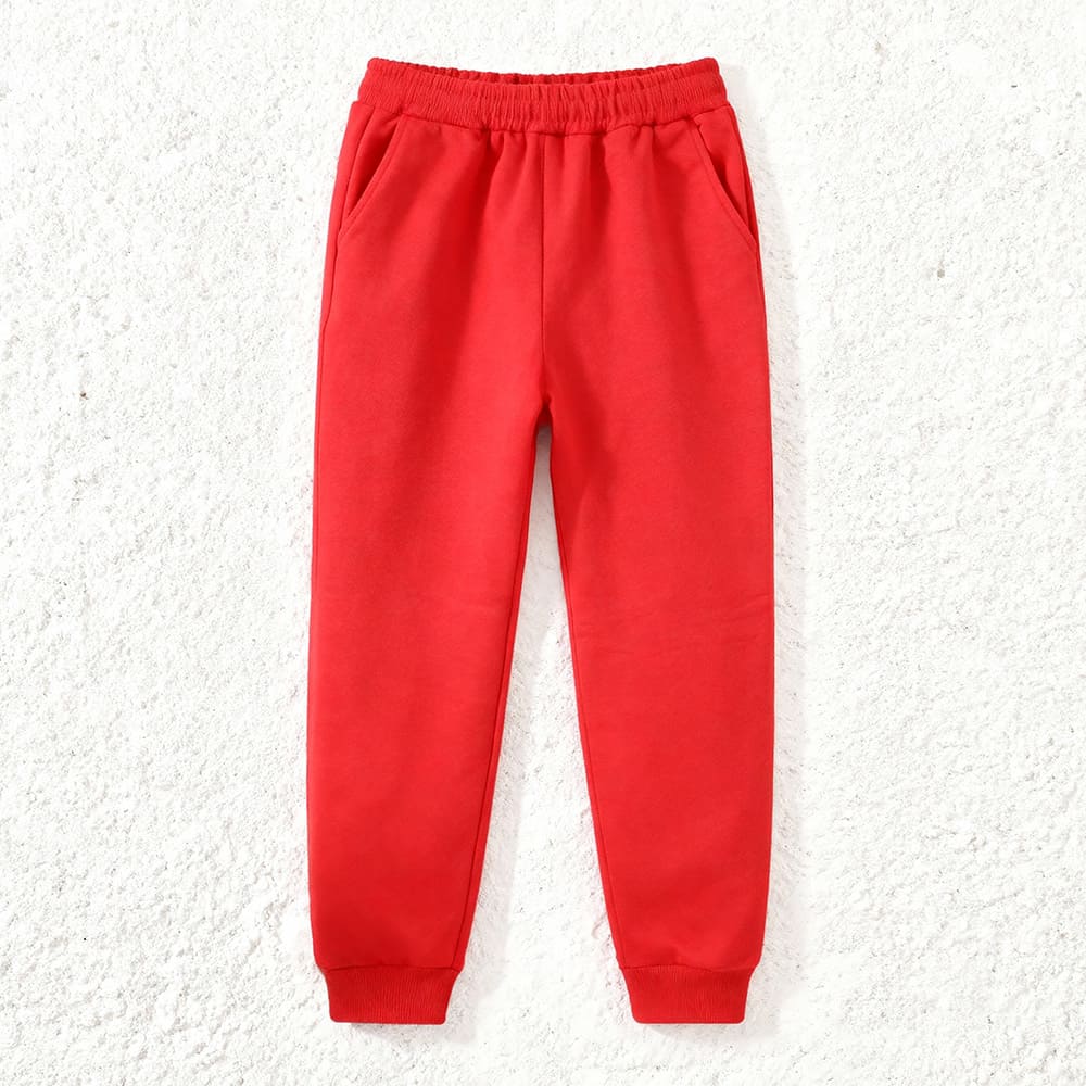 Red kids’ sweatshirt with “DRAGON” graphic and black contrast sleeves, paired with matching red jogger pants — bold, sporty outfit.