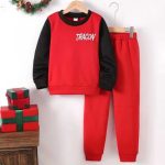 Red kids’ sweatshirt with “DRAGON” graphic and black contrast sleeves, paired with matching red jogger pants — bold, sporty outfit.