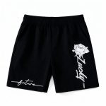 “future” script, and rose print on black shorts — edgy, modern outfit for boys or girls.