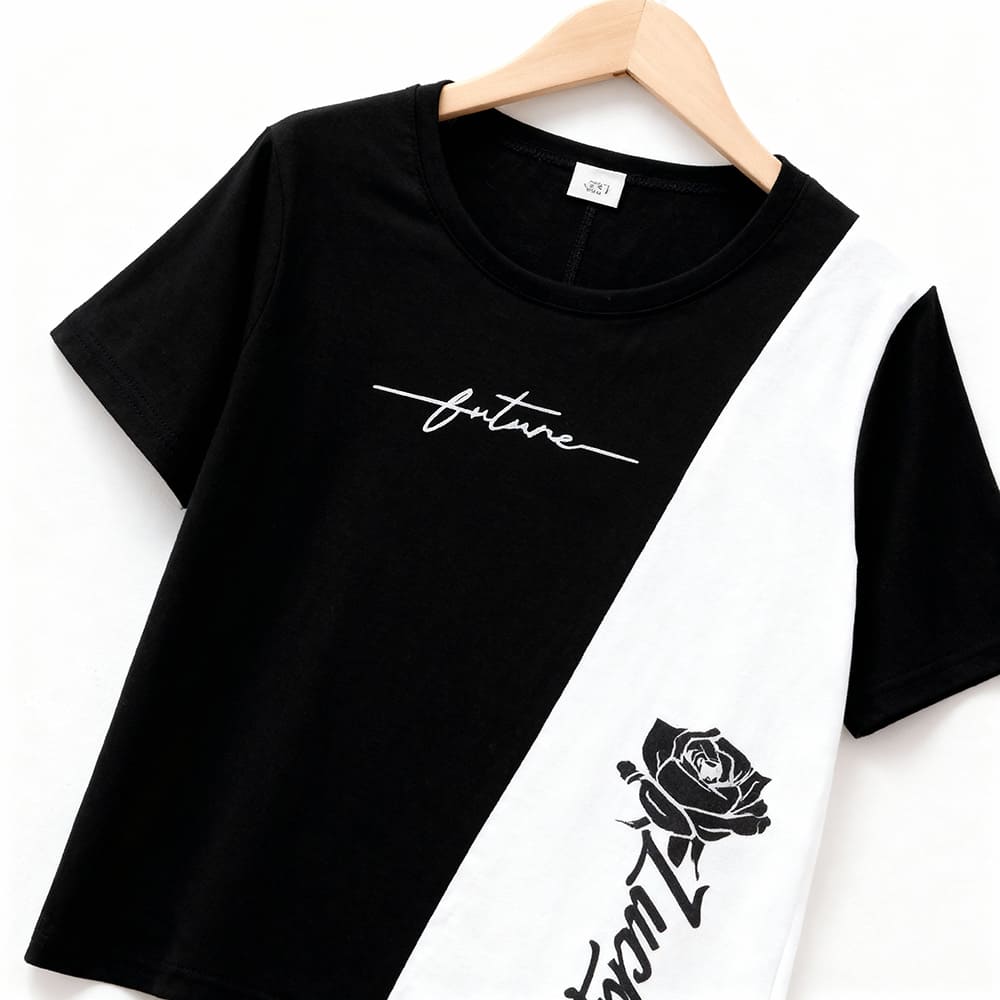 Black t-shirt with white diagonal panel, “future” script, and rose print — edgy, modern outfit for boys or girls.