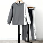 Gray long sleeve top and jogger pants with white side stripe and “Los Angeles” script — modern, minimalist outfit for boys or girls.