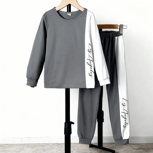 Gray long sleeve top and jogger pants with white side stripe and “Los Angeles” script — modern, minimalist outfit for boys or girls.