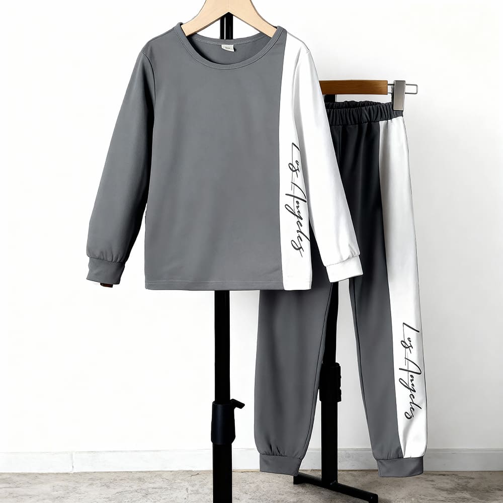 Gray long sleeve top and jogger pants with white side stripe and “Los Angeles” script — modern, minimalist outfit for boys or girls.