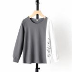 Gray long sleeve top and jogger pants with white side stripe and “Los Angeles” script — modern, minimalist outfit for boys or girls.