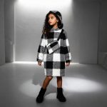 Black and white plaid hooded fleece robe with matching belt — cozy, warm loungewear for kids.