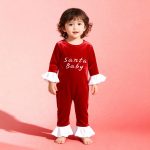 Red velvet “Santa Baby” romper with white ruffled sleeves and cuffs — adorable, festive outfit for newborns and infants.