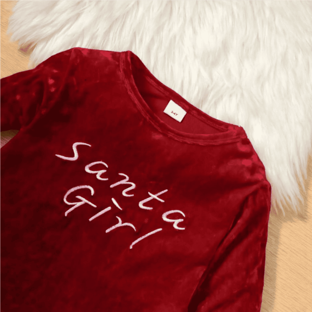 Red velvet “Santa Girl” pajama set with white trim and matching Santa hat — cozy, festive sleepwear for girls.