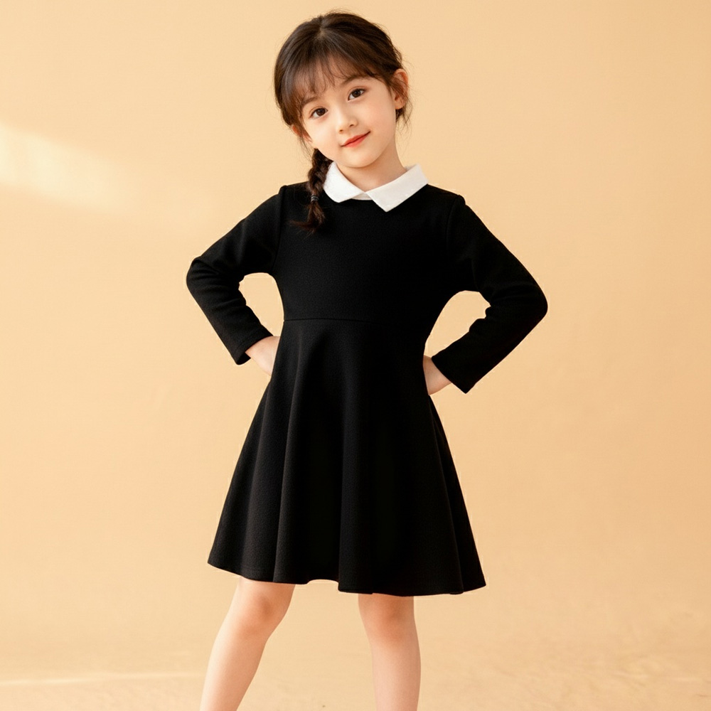 black-peter-pan-dress-model-pose-styles-by-syl A girl on Black long-sleeve dress with white Peter Pan collar.