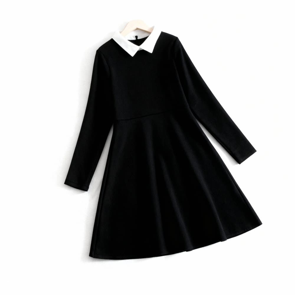 black-peter-pan-dress-styles-by-syl-1 Black long-sleeve dress with white Peter Pan collar.