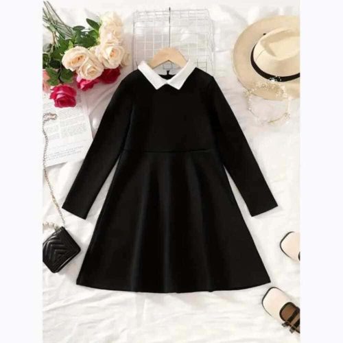 Black long-sleeve dress with white Peter Pan collar.