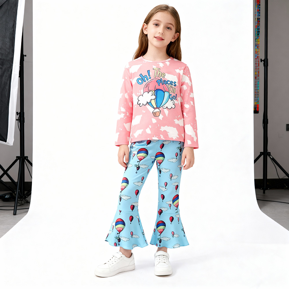 oh-the-places-ill-go-pajama-girl-styles-by-syl Pink “Oh The Places I’ll Go” top and blue balloon-print bell bottom pants