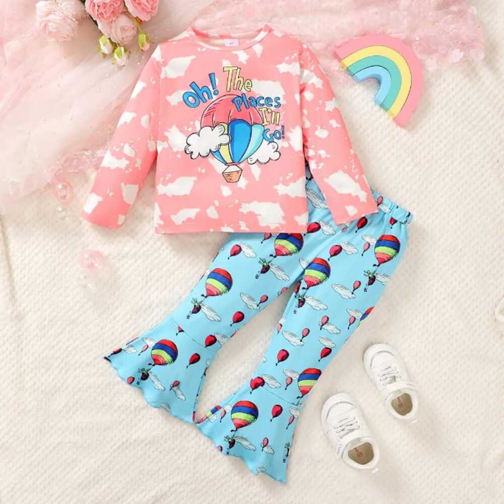 Pink “Oh The Places I’ll Go” top and blue balloon-print bell bottom pants