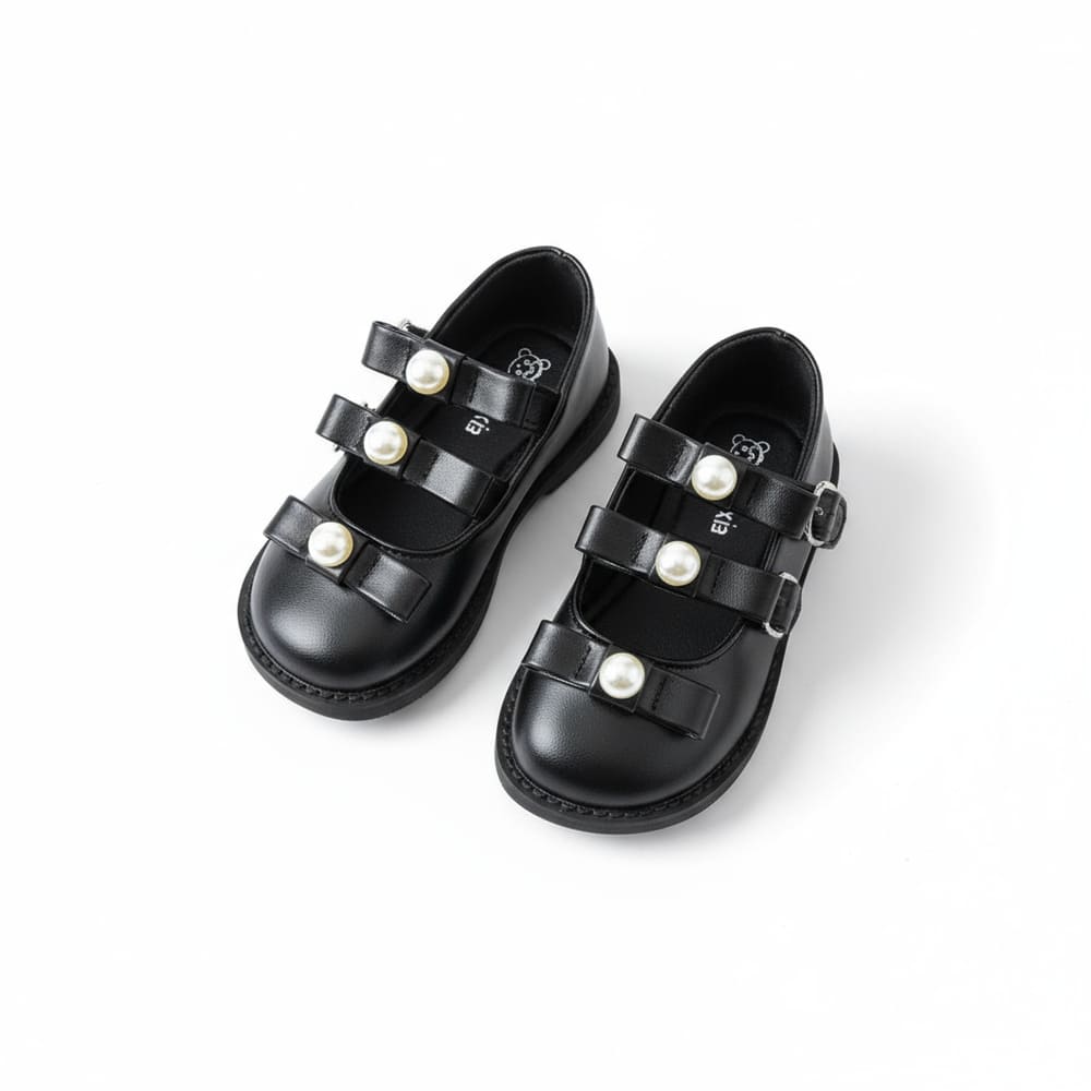 Girl’s black Mary Jane shoes with double strap and pearl embellishments