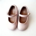 Girl’s dusty pink Mary Jane shoes with pearl accent