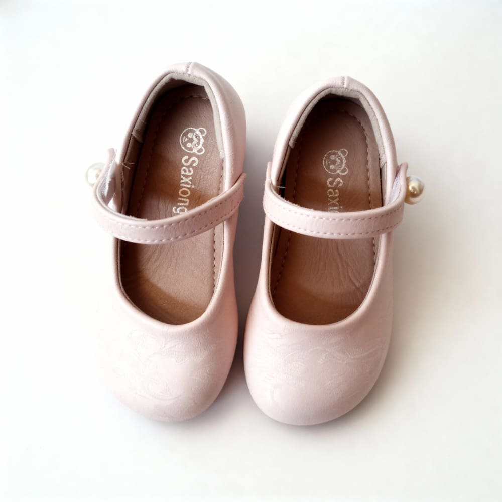Girl’s dusty pink Mary Jane shoes with pearl accent