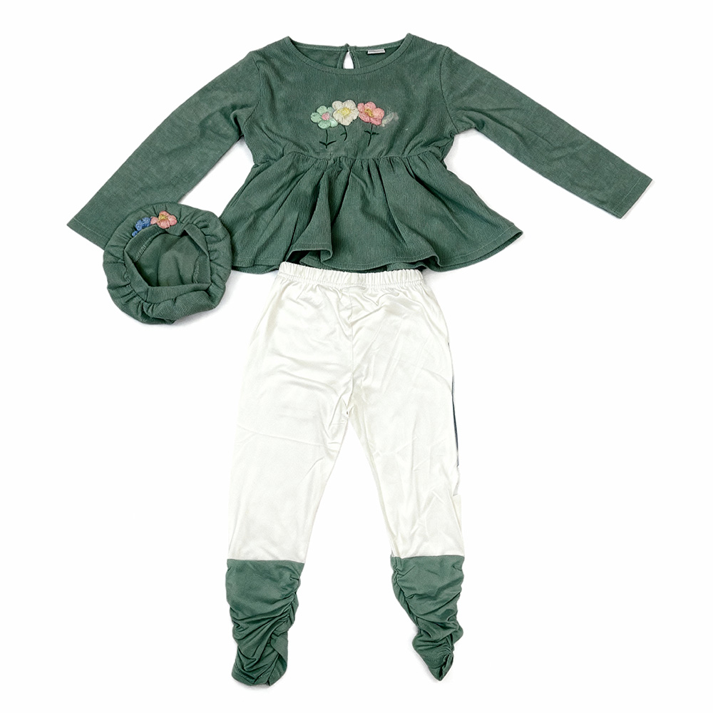 Sage green floral top and cream ruched pants