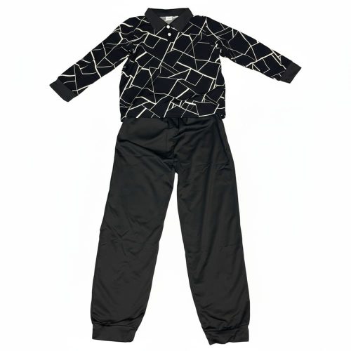 Boy in black geometric polo and matching joggers