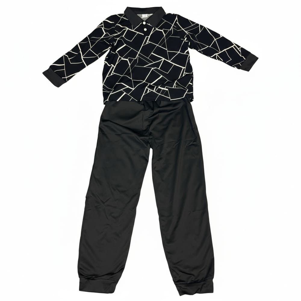 Boy in black geometric polo and matching joggers