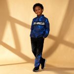 Blue lightning-print top and black joggers with lightning panels