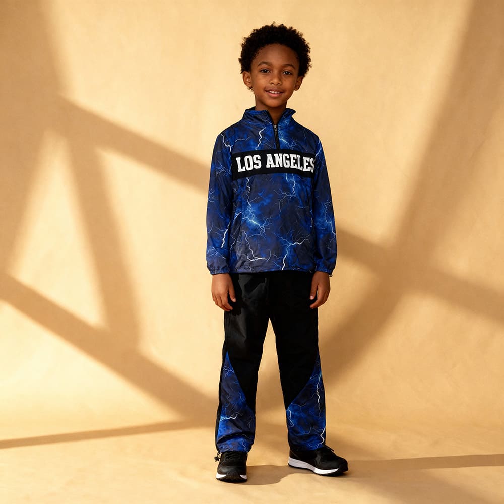 Blue lightning-print top and black joggers with lightning panels