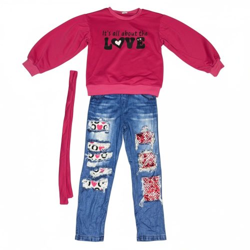 Girl wearing pink “Love” sweatshirt and sequin denim leggings