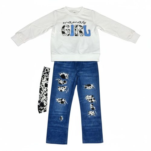 Girl wearing white “mama’s girl” sweatshirt and cow print denim leggings