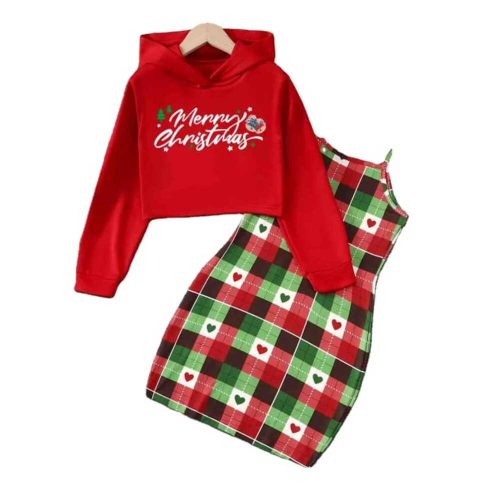 Girl wearing red “Merry Christmas” hoodie and plaid slip dress