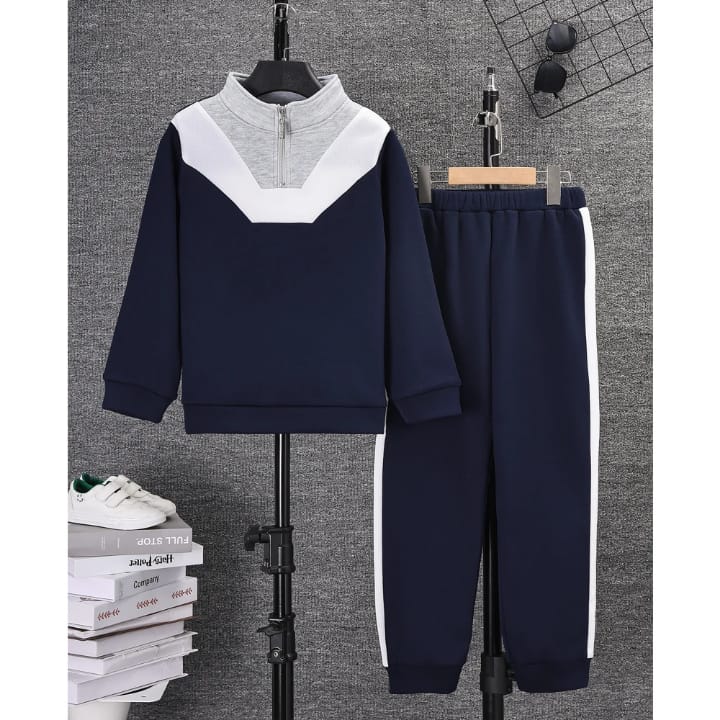 Navy quarter-zip top and striped joggers