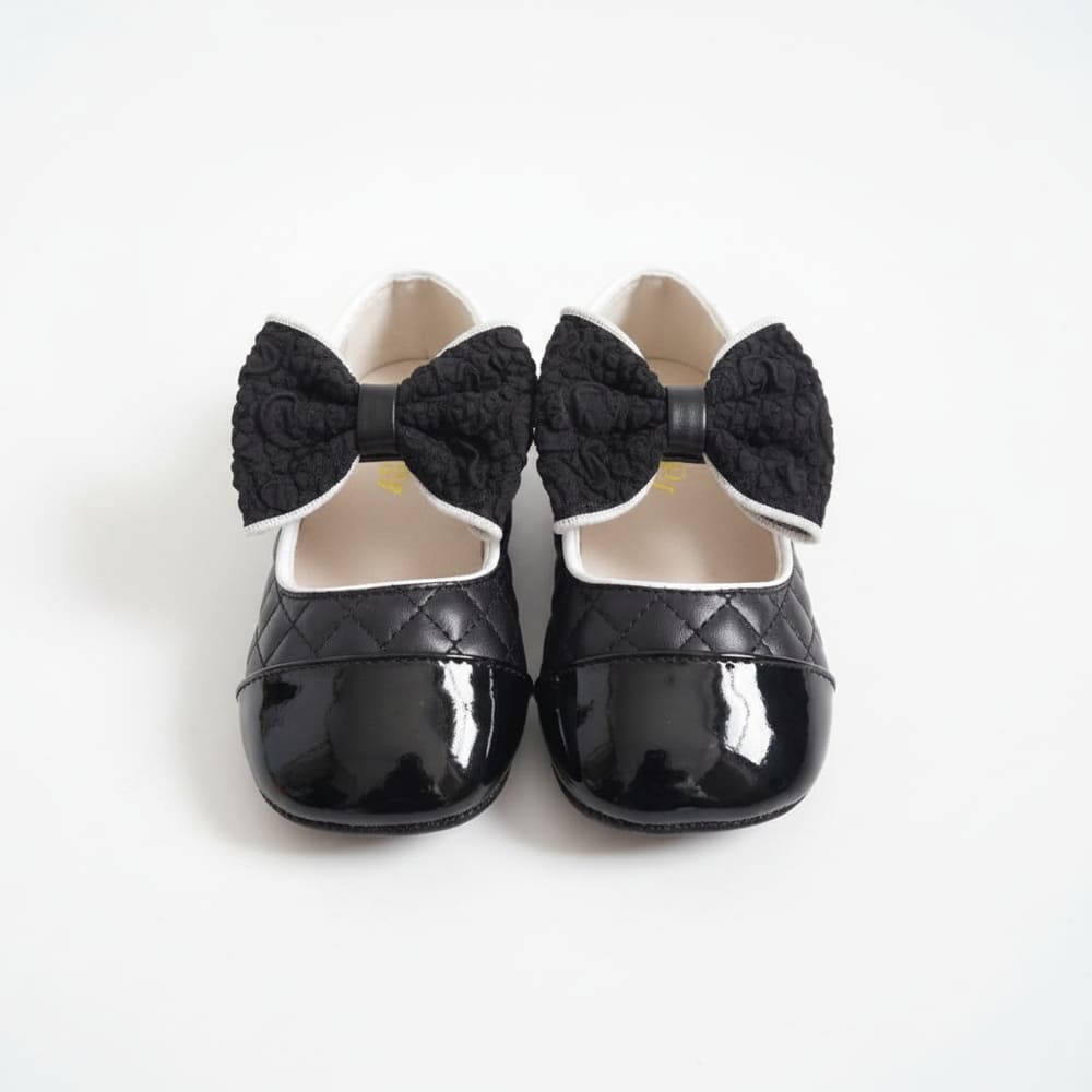 quilted-two-tone-shoes-girl-styles-by-syl-2 Girl’s cream quilted Mary Jane shoes with black toe cap and fluffy bow