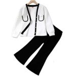 Girl wearing white quilted cardigan with black trim and black flare pants