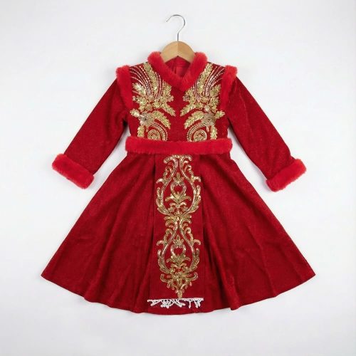 Girl wearing red velvet dress with gold embroidery and faux fur trim