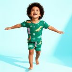 Navy dinosaur-in-space print pajama set