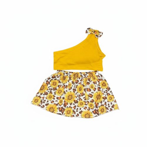 Girl wearing mustard one-shoulder top and sunflower-leopard skirt