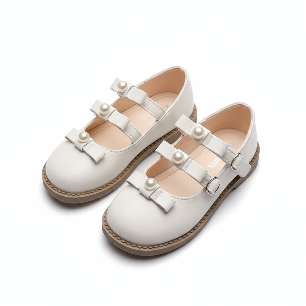 Girl’s white Mary Jane shoes with double strap and pearl embellishments