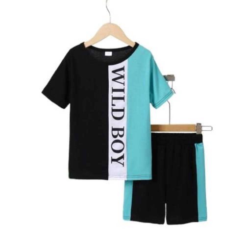 Boy wearing black-teal “Wild Boy” t-shirt and matching shorts