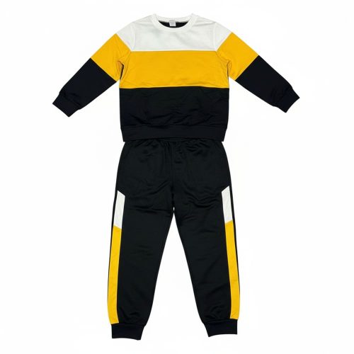 Boy in yellow-black color block sweatshirt and striped joggers